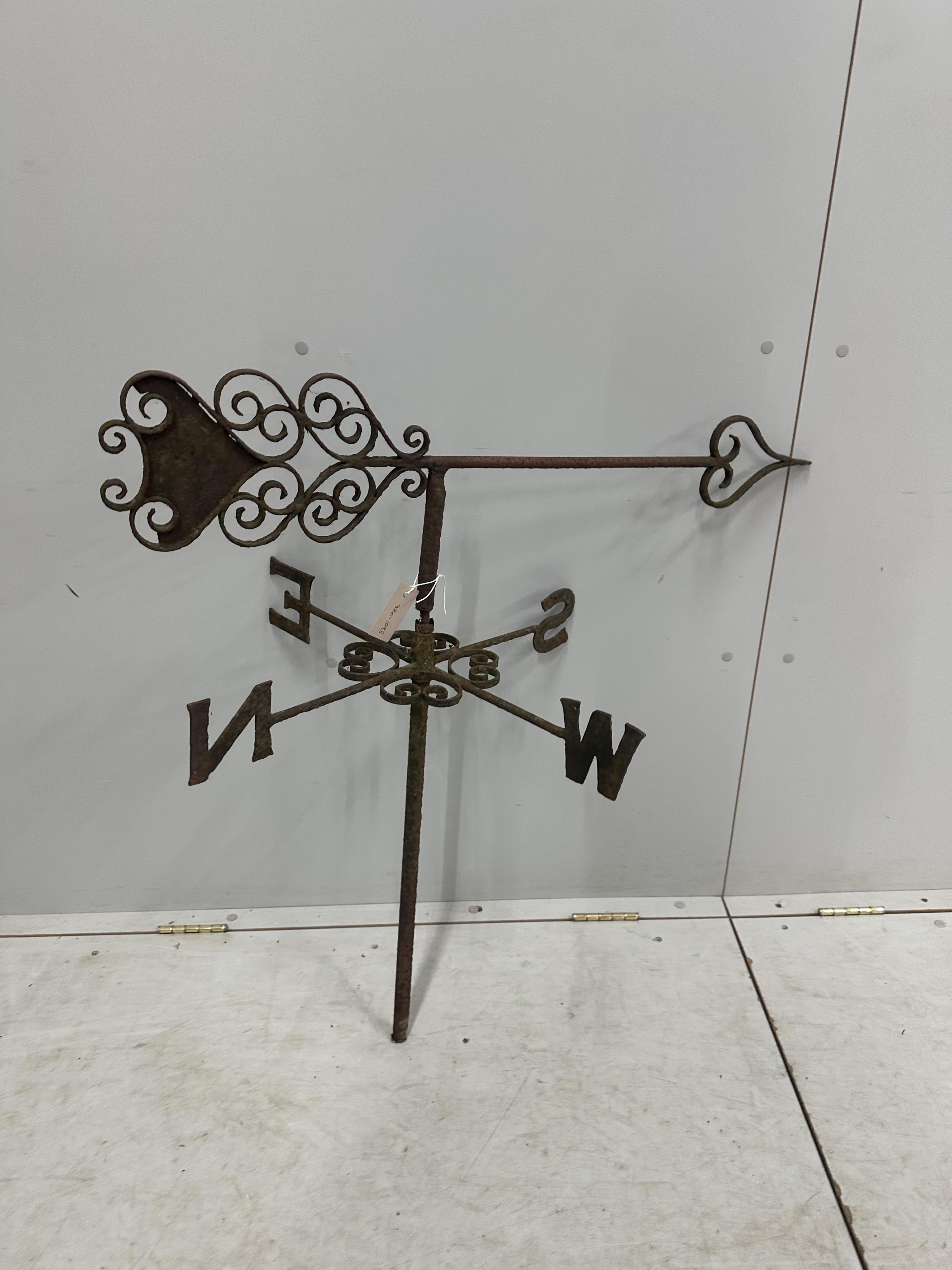 A wrought iron weather vane, height 90cm. Condition - poor to fair